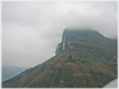 Mist covered hilltop.