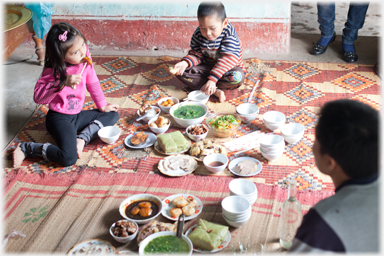 Children eating first.