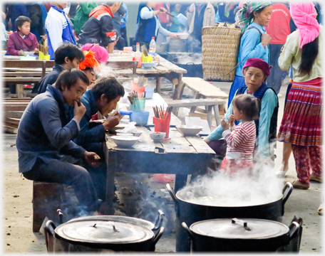 Family eating in cafe.