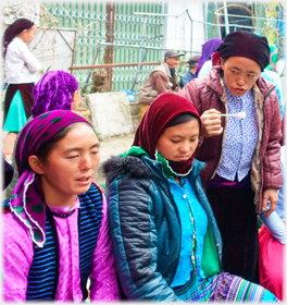 Women tasting drink.