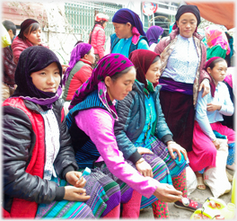 Row of women sitting.