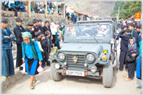 Crowd admiring Jeep.