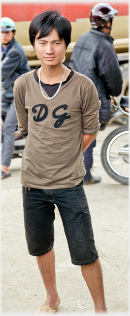 Man standing D+G pullover.