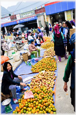 Oranges being sold on the street.