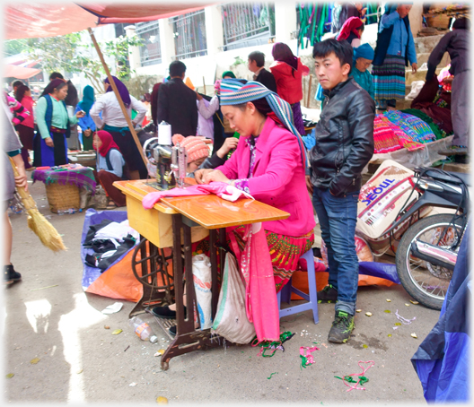 Sewing on the street.