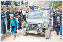 Jeep in main street of Meo Vac.