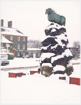 Moffat Ram in snow and the Moffat House Hotel.