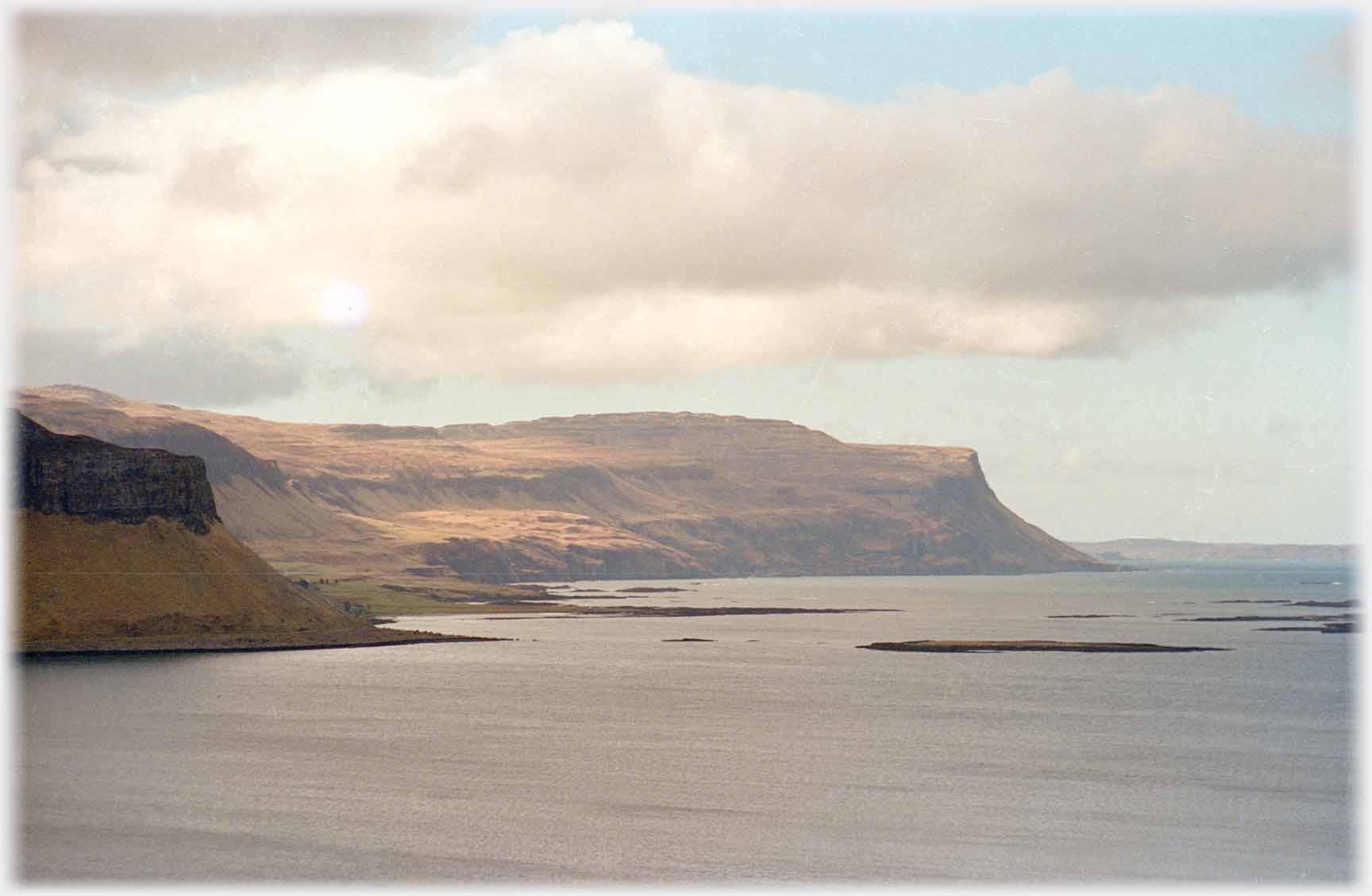 Bay with islets and cliffs.