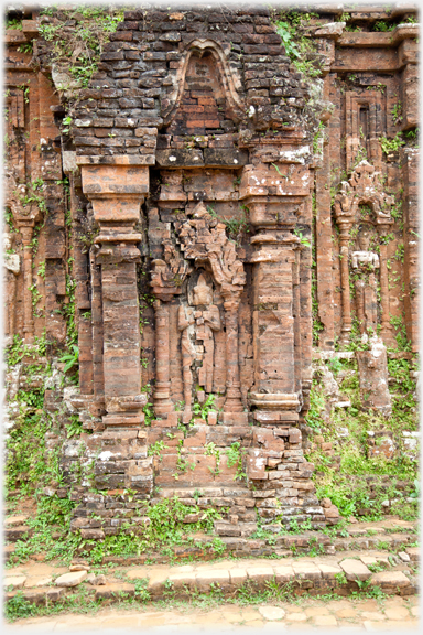 Carving in brick wall.