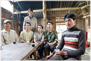 Locals drinking in cafe.