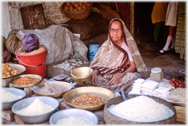 Woman with dried goods.