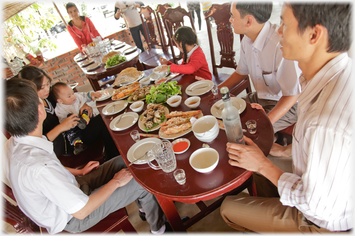 Sitting down to lunch.