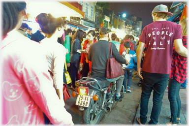 Motorbike in crowd