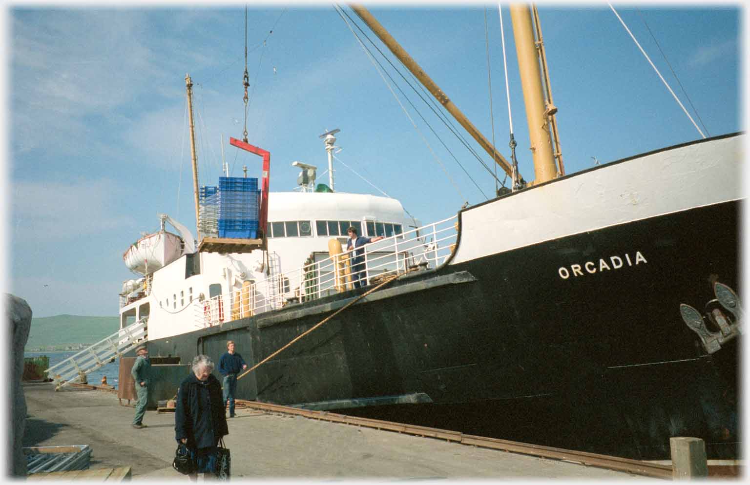Ship at quayside being unloaded.