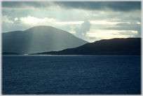 Evening light over the island of Barra from the sea.