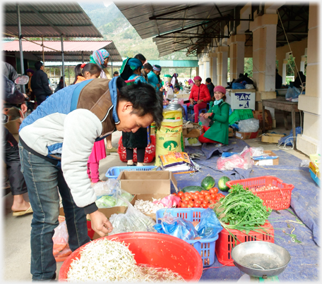 Man buying vegetables.