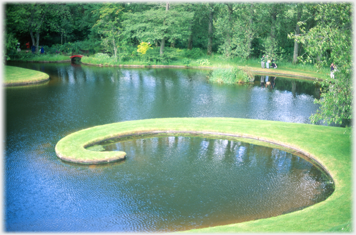 Grass hook reaching into the main pond.