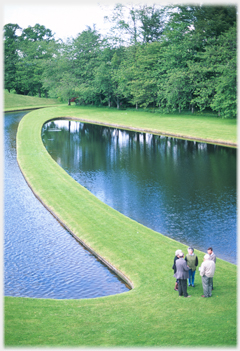 Grass isthmus between ponds.