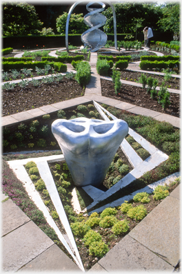 The DNA Garden with Double Nose sculpture in foreground and Double Helix in background.