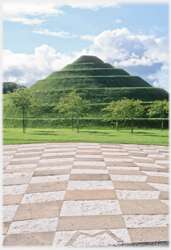 Fractal terrace paving and the snail mound beyond.