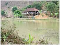 House by a river.