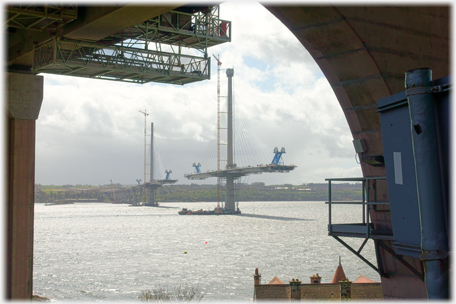 Towers framed from road bridge