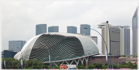 The Durian with tower blocks behind.