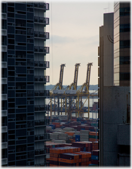 Dockside cranes and containers.