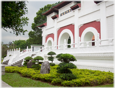 Entrance with steps and boonsai.