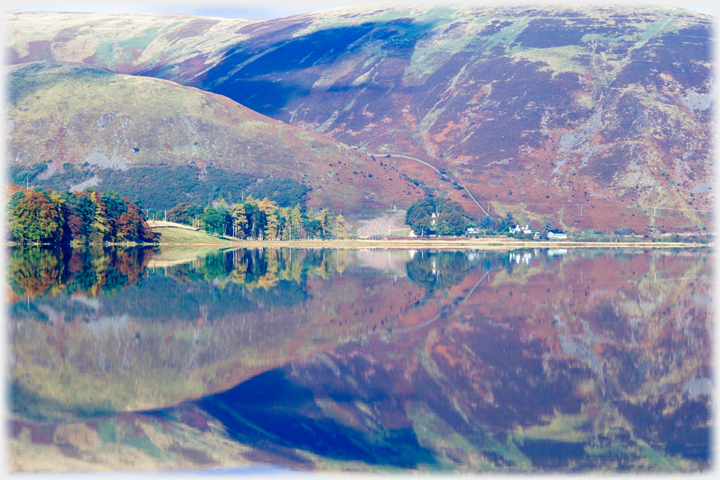 Henderland Bank reflected in the Loch.