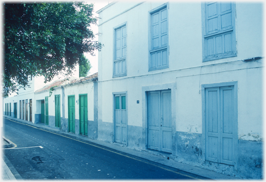 Street with doors and windows shuttered.