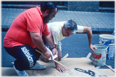 Men and flower carpet.