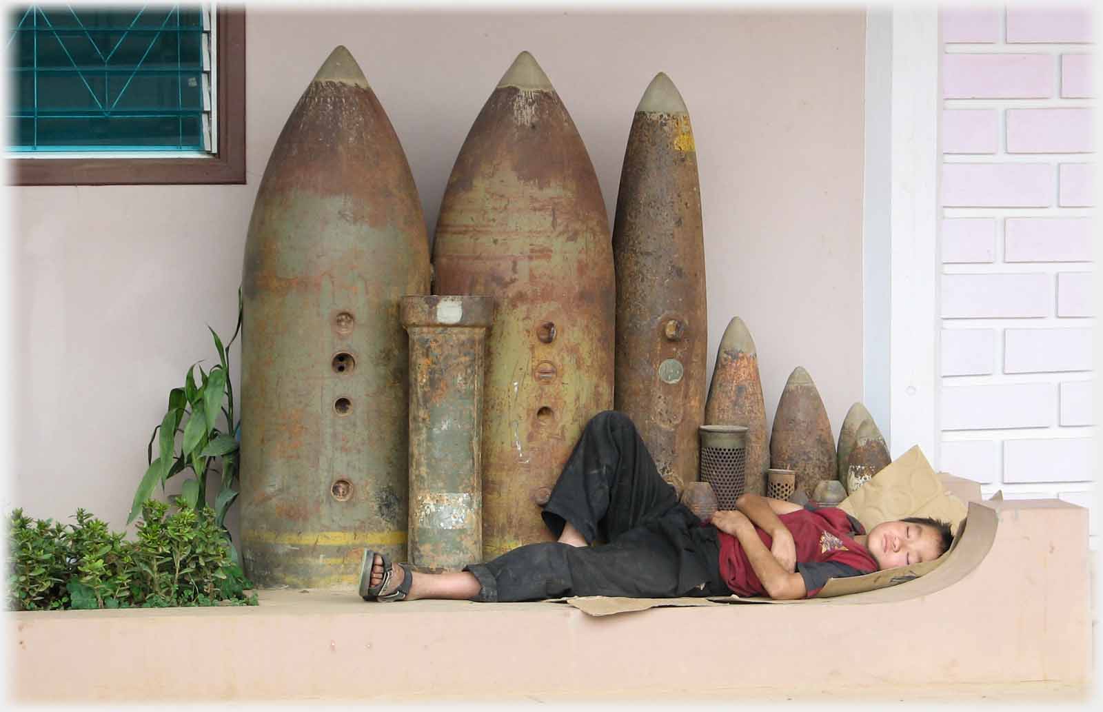 Line of bombs with sleeper beside them.