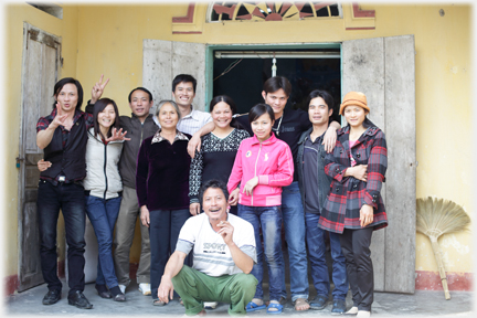 A group of friends want a front door photograph, but not quite so orderly.