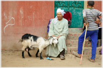 Man with goat.