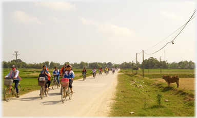 Pupils on bicycles.