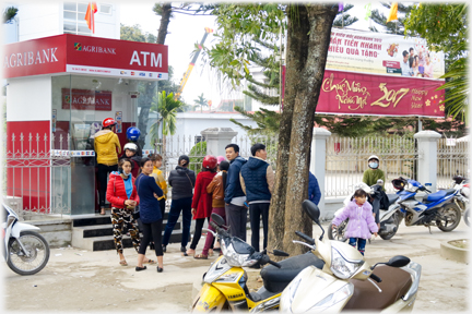 Queue at ATM.