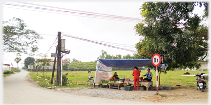 Stall at road junction.