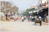 Looking along Tinh Gia's main shopping road.