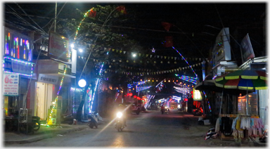 Another street with various illuminations.