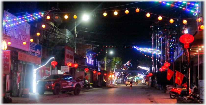 Street lined with Chinese style lanterns.