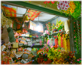 Calendars and plastic flowers.