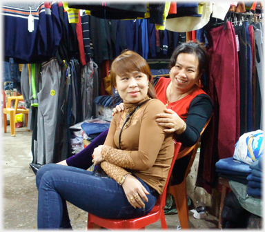 Two women sitting.