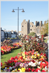 Flowerbeds and castle in Kirkcudbright.