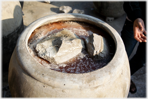 Looking into the top of a barrel of fermenting sauce.