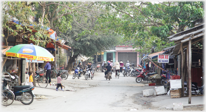 Our road beside the back gate of the market.