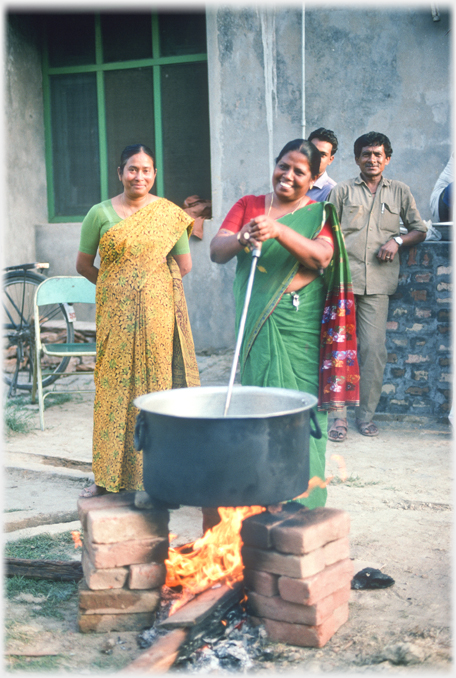 Cooks making the meal.