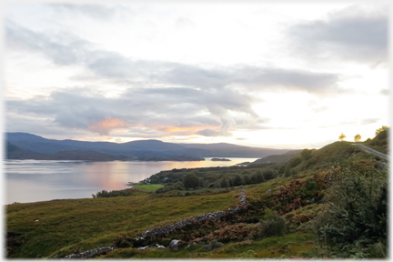 Sun setting across loch.