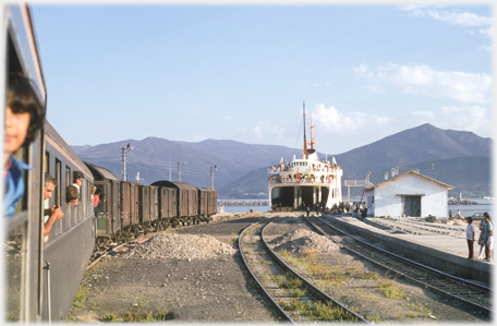 Rail lines leading to boat