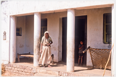 Woman on her veranda.